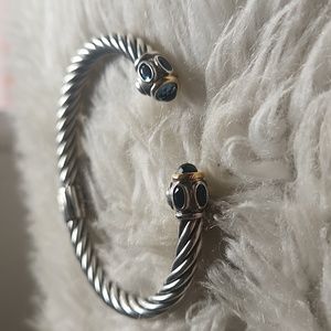 Silver bracelet with gold and sapphire